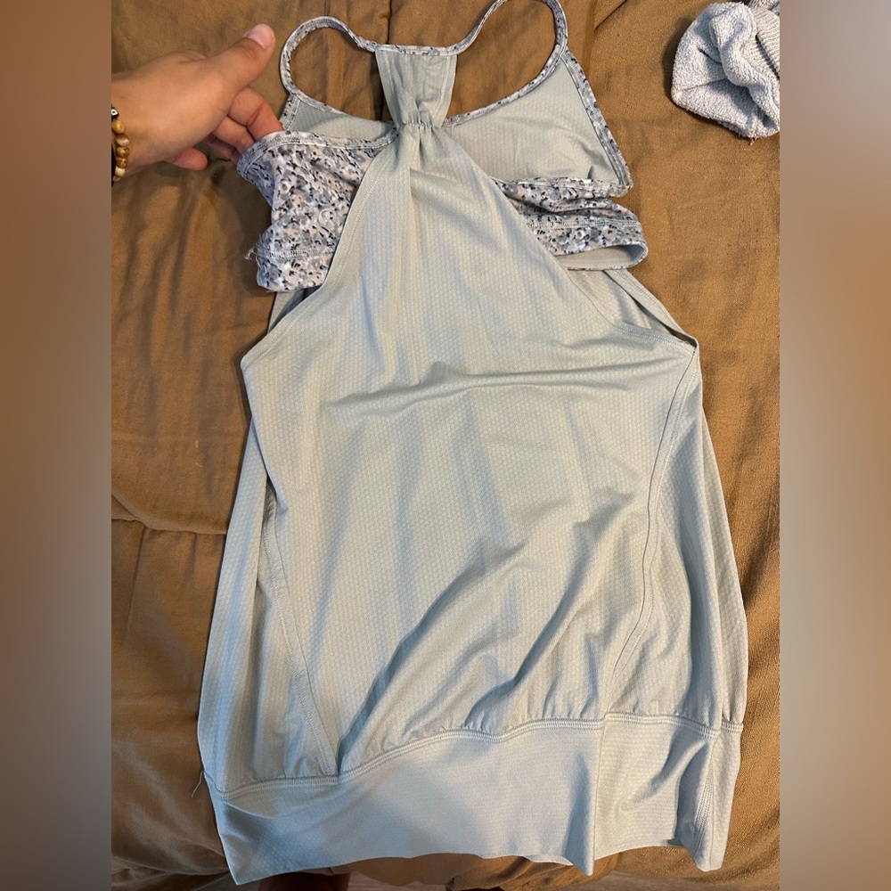 Grey Lulu tank with built in sports bra. The bra fits like a small.